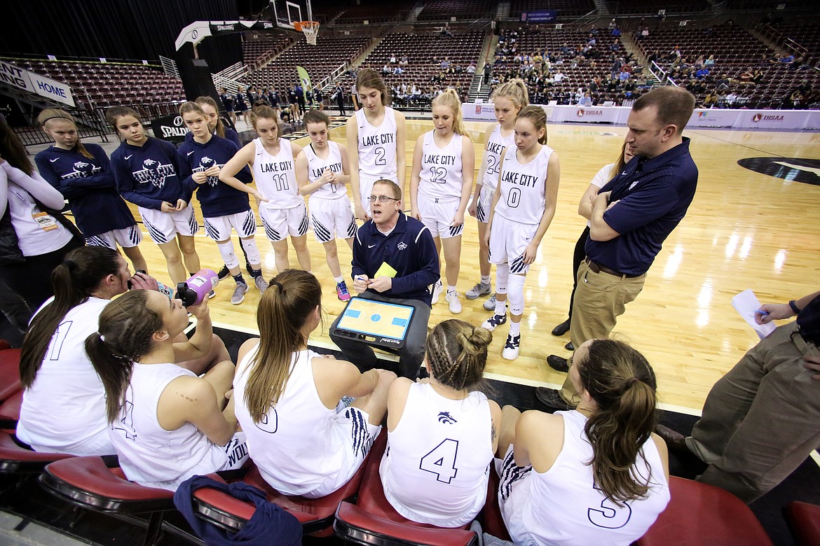 Photo by JASON DUCHOW PHOTOGRAPHY
Lake City coach James Anderson looks to the scoreboard during a fourth-quarter timeout in the Timberwolves&#146; game against Eagle in the first round of the state 5A girls basketball tournament at the Ford Idaho Center in Nampa.