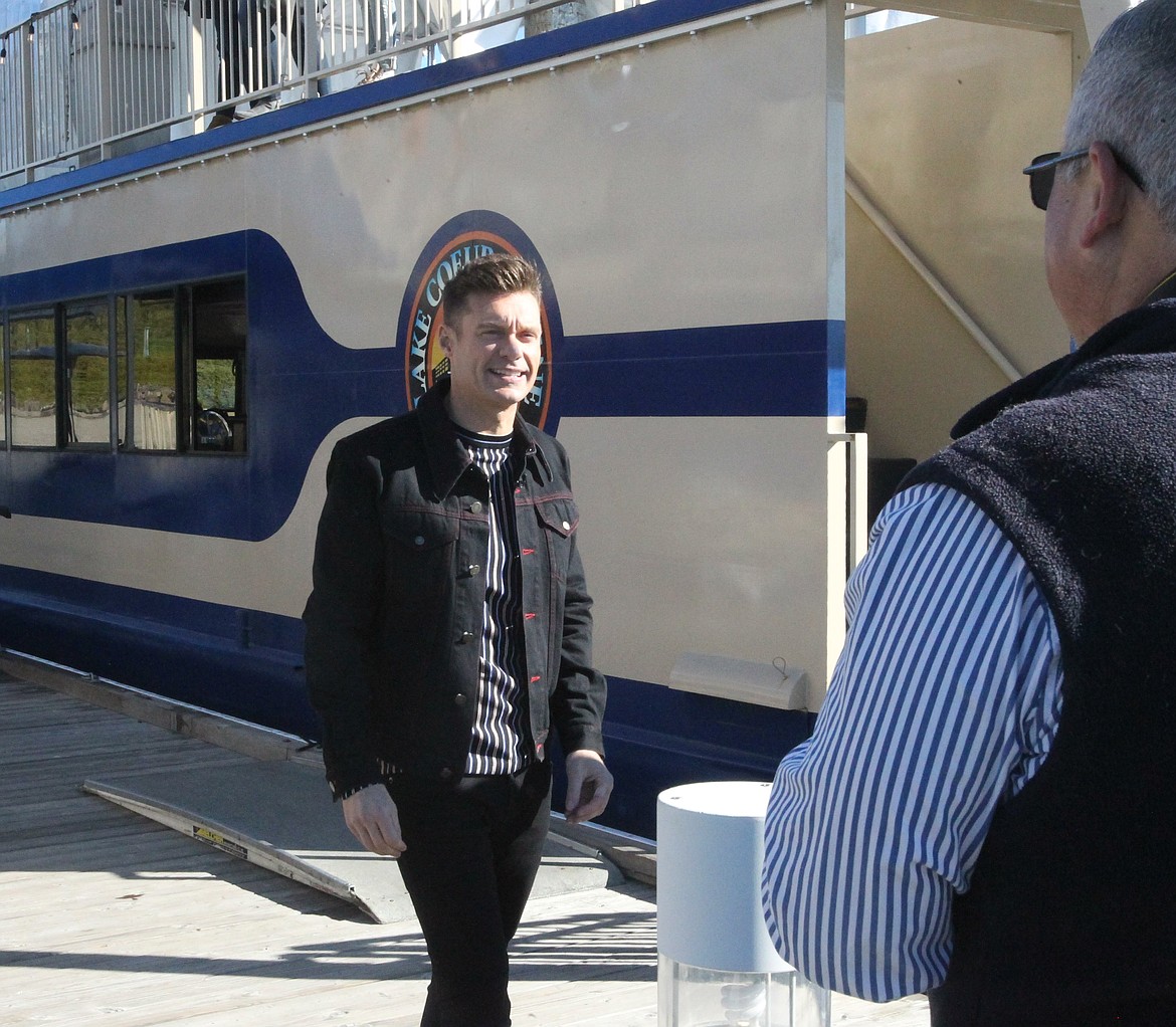 TV star and &quot;American Idol&quot; host Ryan Seacrest saunters down a Hagadone Event Center dock when auditions were held in Coeur d'Alene in October. (DEVIN WEEKS/Press File)