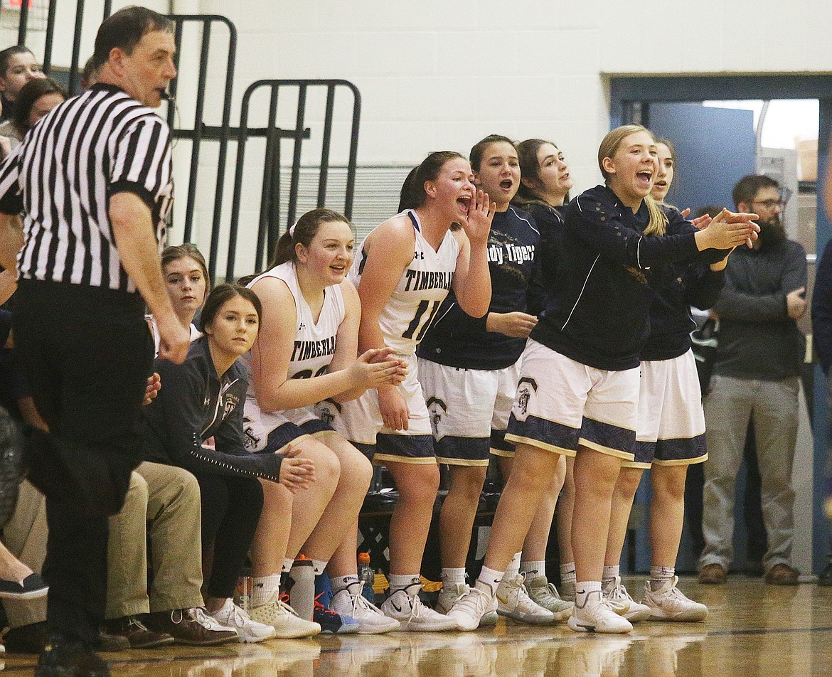 LOREN BENOIT/Press
The Timberlake bench celebrates a 3-point basket in the 3A District 1 title game against Kellogg last week. After six title-game appearances in seven seasons, the Tigers placed third last year.