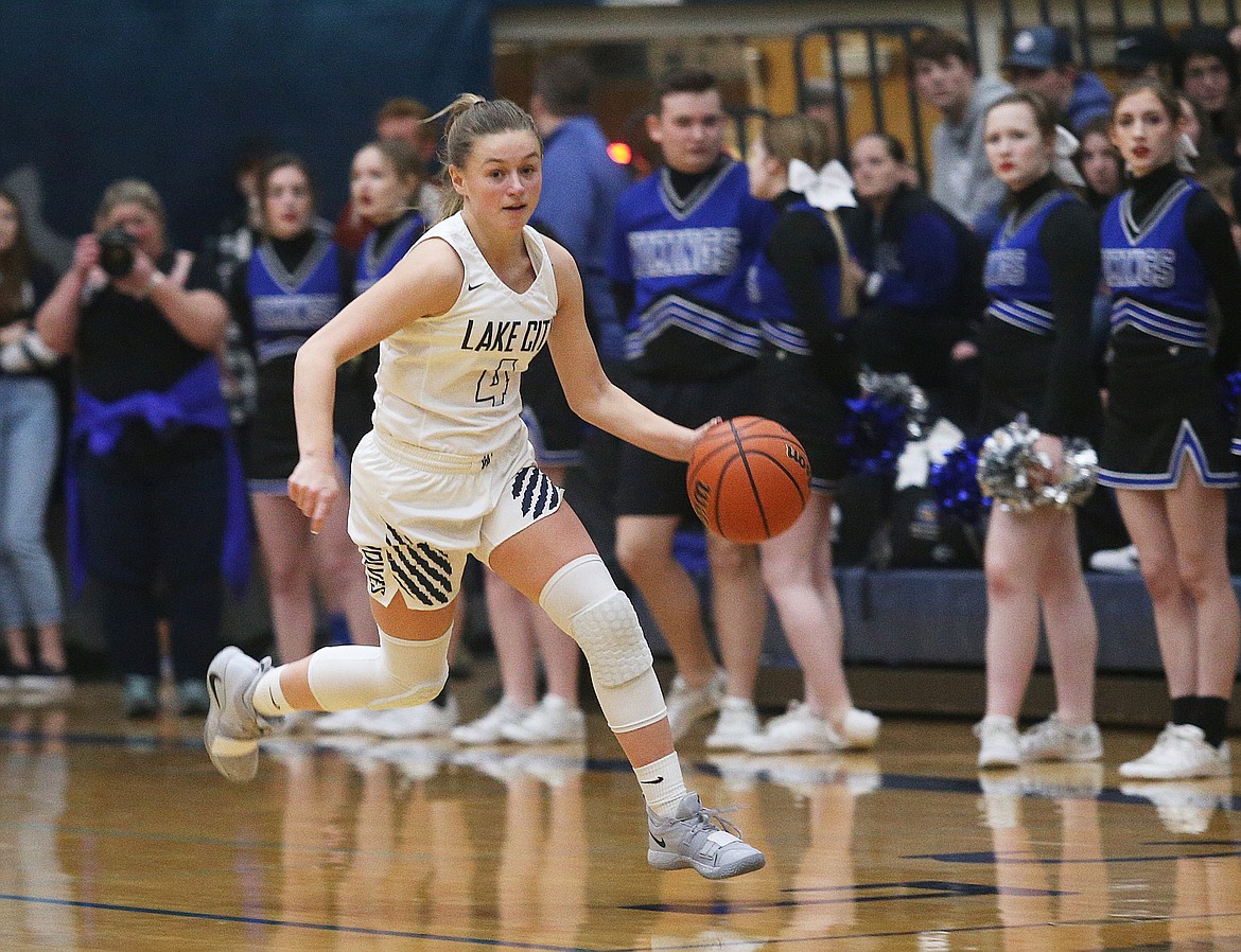 Chloe Teets dribbles the ball down the court during Fight for the Fish in January. (LOREN BENOIT/Press)