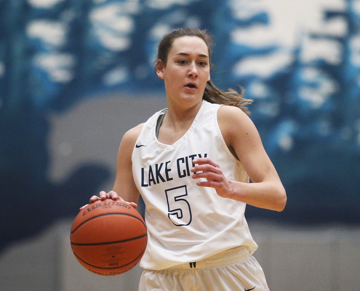 Bridget Rieken dribbles the ball down the court in a game against Coeur d'Alene in January. (LOREN BENOIT/Press)