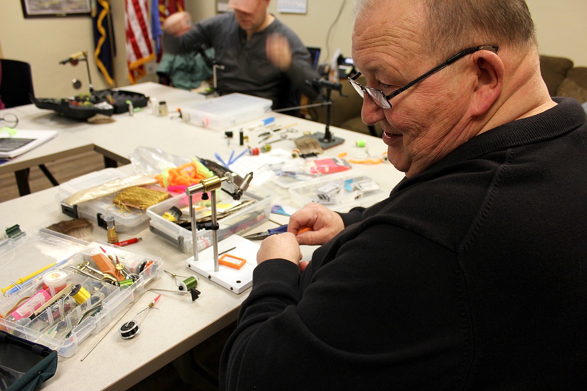 Fly tying, which requires complete focus, is considered recreational therapy. Officials with the Kalispell Vet Center say the group offers social time for some veterans who have a tendency to isolate themselves.