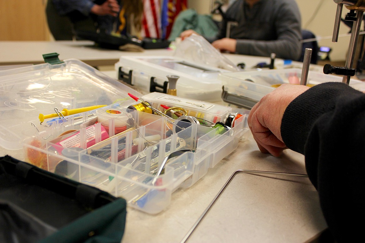 Most of the materials and equipment needed for fly tying are provided by the club. The colorful supplies make every creation unique.