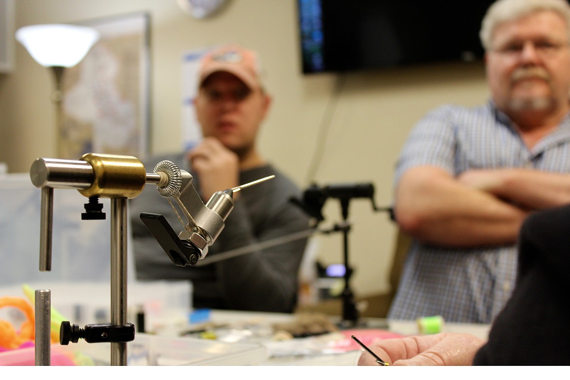 The basics that are needed for fly tying include a vise (pictured), bobbin for thread, another vise to hold the hook, actual hooks, thread, feathers and fur. (Kianna Gardner/Daily Inter Lake)