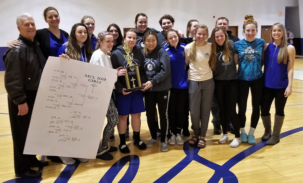 Courtesy photo
After placing second in the eight-team Mountain Christian League, the second-seeded North Idaho Christian School girls basketball team won the MCL Tournament held Feb. 8-9 in Pullman. In the front row from left are head coach Jerry Bittner, Katie Van Leuven, Jolie Ward, Savannah Seeley, Jinny Choi, Alli Whiteman, Katie Malinauskas, Sarah Hines, Riley Anderson and coach Kylee Kramer; and back row from left, coach Mary Schlader, Courtney Monaghan, Hailey LePard, Imelda Bresee, Ryley Overturf, Heidi Williams and coach Dave Kelly.