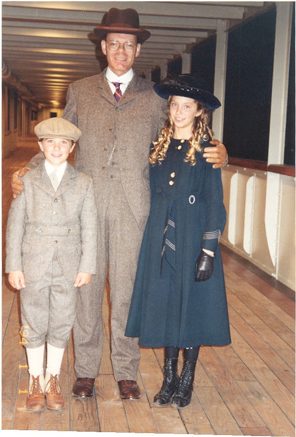 Don Lynch, center, portrayed first-class passenger Frederic Spedden in the movie Titanic. Here, Lynch is shown in the set for the 1997 movie in Rosarito, Mexico.&#160;The little boy, Thomas Fiss, portrayed Frederic&#146;s son Douglas.&#160; The boy spun a top in the movie on the boat deck. The girl is Thomas&#146; sister, Chelsea, who was also an extra in the movie. (Courtesy photo)