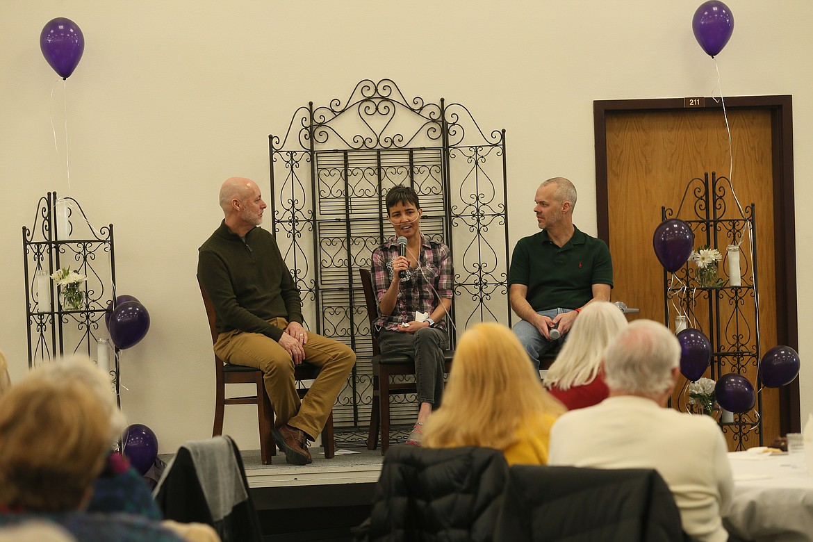 Jen McKenna, who suffers from cystic fibrosis, shares an update with the crowd Sunday at Coeur d&#146;Alene Bible Church just about a week before she leaves for North Carolina for a double lung transplant. Also pictured: Pastor Kurt Staeuble, left, and Jen&#146;s husband, Corey. (DEVIN WEEKS/Press)