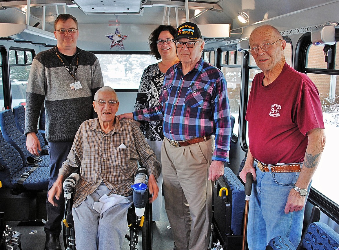 A new passenger bus was recently unveiled at the Montana Veterans Home. Checking out the bus are, left to right, administrator Joren Underdahl, Lewis McCready, recreation supervisor Bonnie Stutsman, Bob Wood and Mac McPhee. (Photo courtesy Whitefish Community Foundation)