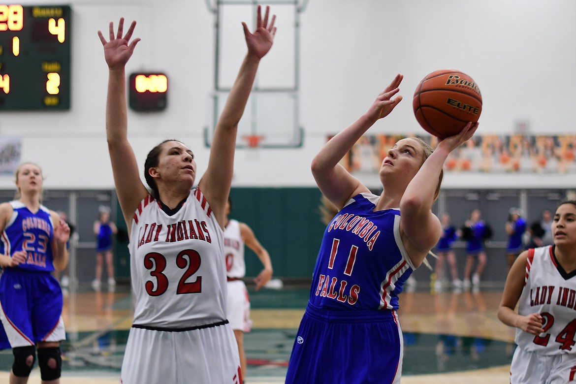 Savvy Ellis goes up for a basket in the first quarter against Browning Saturday. (Jeremy Weber photo)