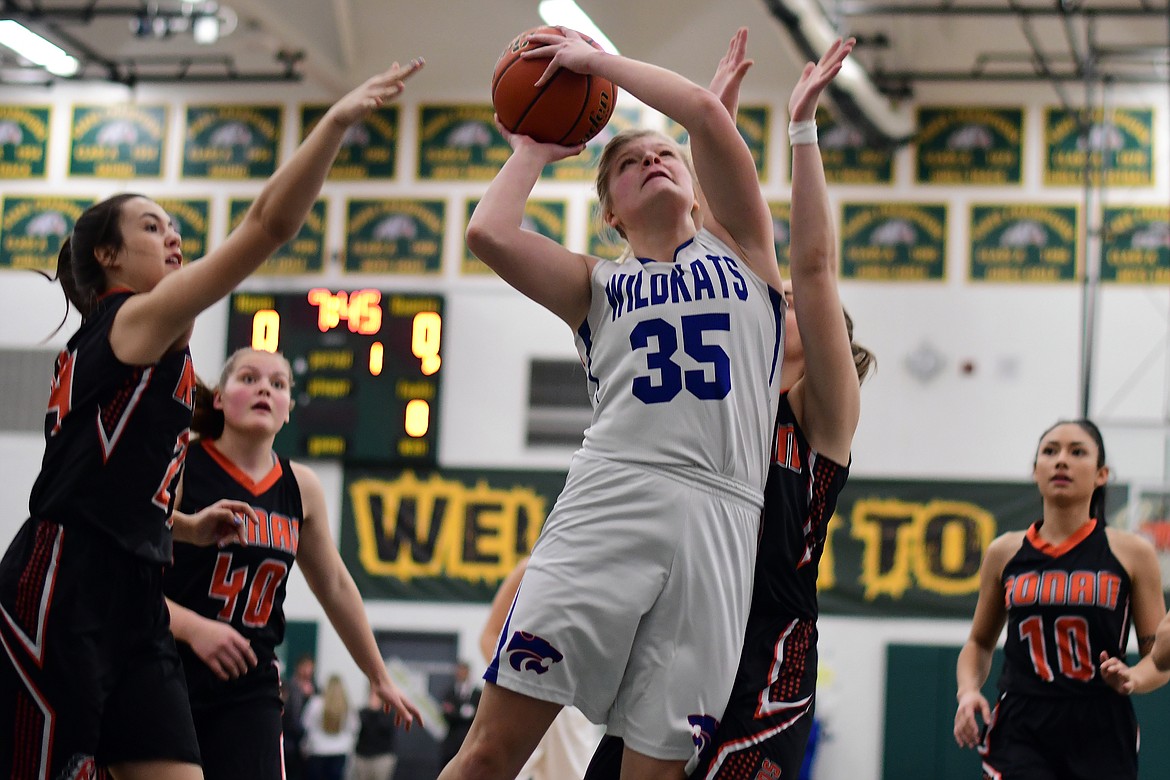 Trista Cowan goes up for two of her 17 points in the Wildkats&#146; 74-34 win over Ronan Friday. (Jeremy Weber photo)