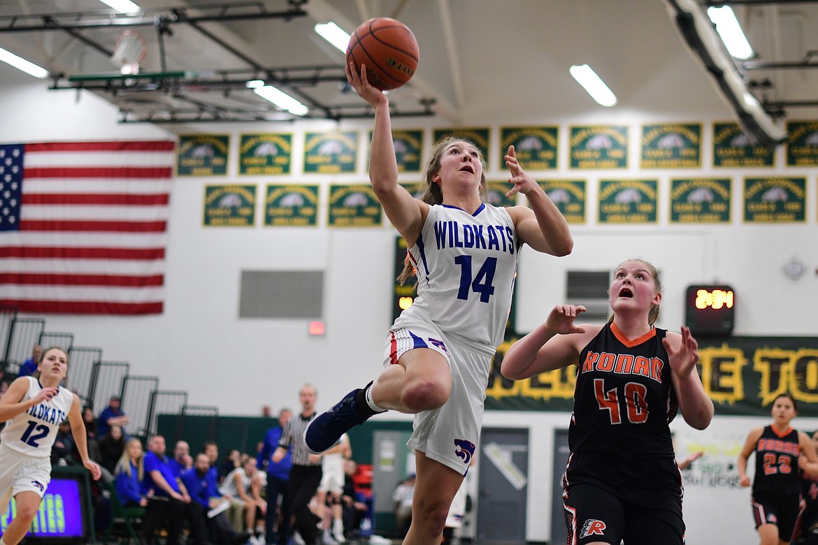 Josie Windauer goes up for a layup in the Wildkats&#146;s 74-34 win over Ronan Friday. (Jeremy Weber photo)