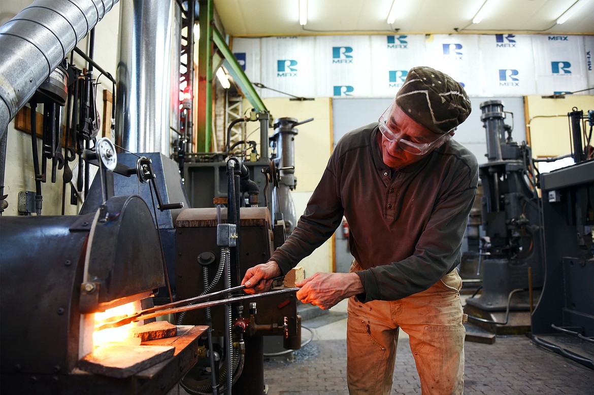 Jeffrey Funk works at a forge in his shop near Bigfork on Wednesday, Feb. 6. (Casey Kreider/Daily Inter Lake)