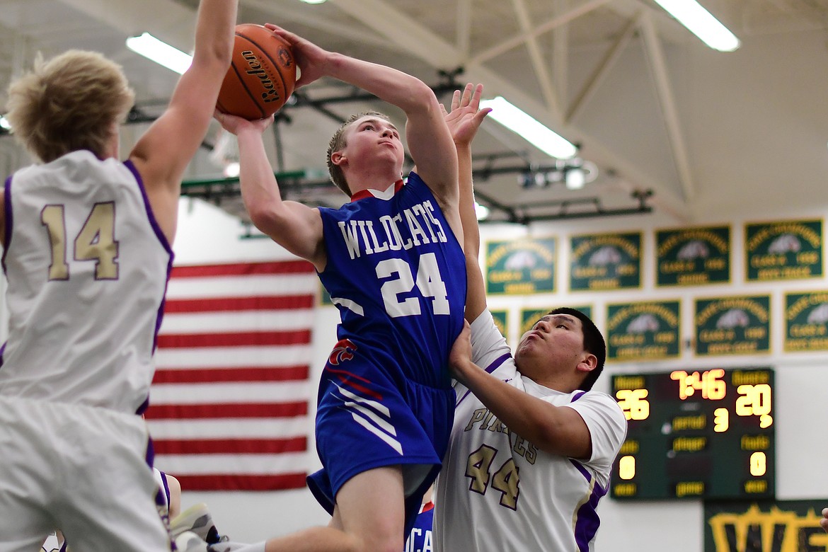 Logan Bechtel goes in for a layup to open the second half against Polson Thursday. (Jeremy Weber photo)