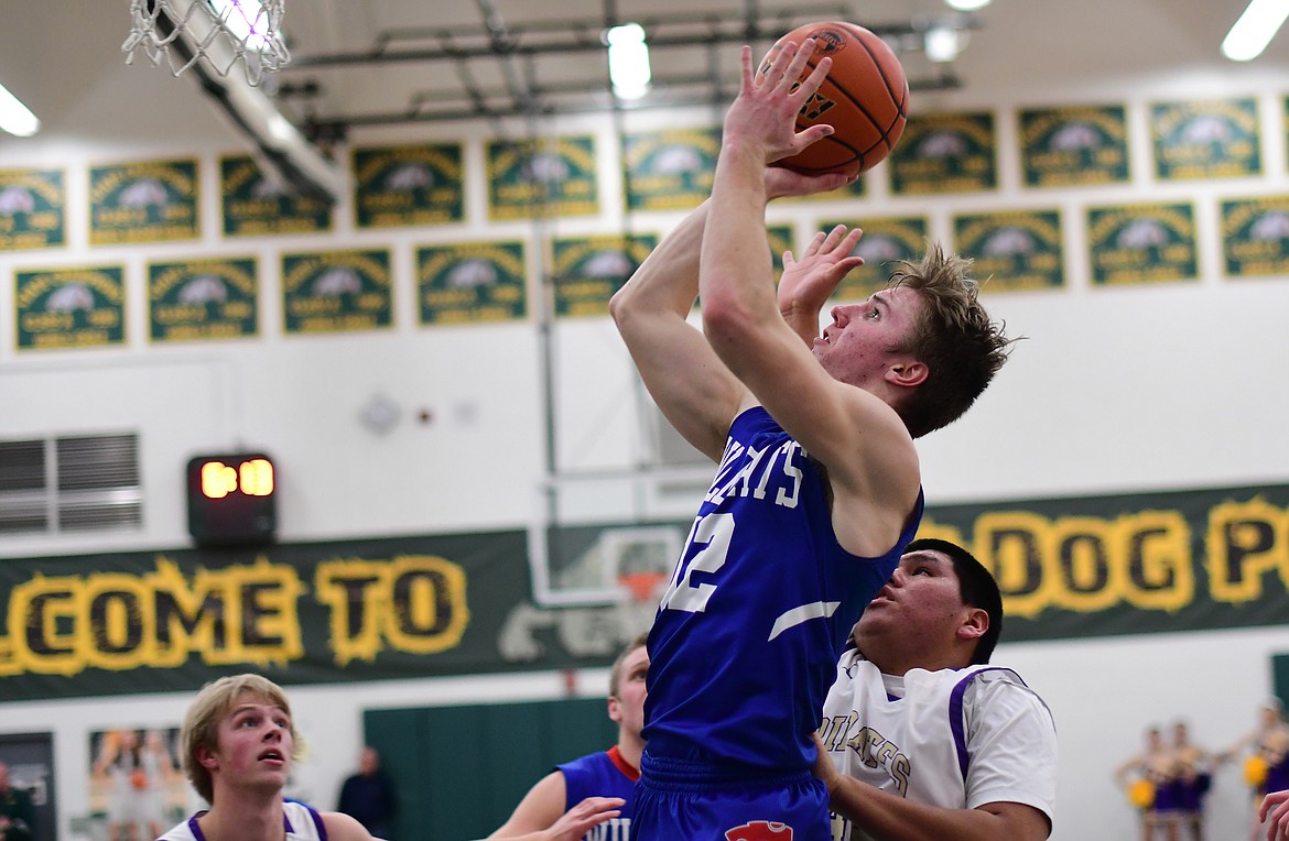 Drew Morgan takes a jumper in the second quarter against the Pirates Thursday. (Jeremy Weber photo)