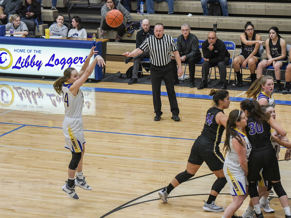 Good ball handling by her teammates set Libby senior Jayden Winslow up for a wide-open shot for three early in the first quarter Saturday against Polson. (Ben Kibbey/The Western News)