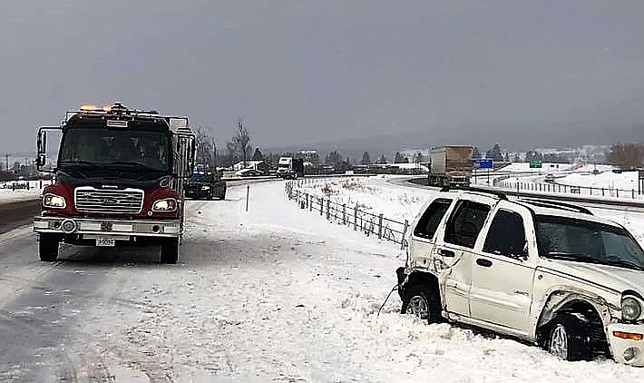 The Frenchtown Rural Fire Department responded to an incident on Feb. 6 near Mile Marker 27 involving a white SUV. Montana Highway Patrol is asking drivers to slow down and be prepared for winter weather driving. (Photo courtesy of Frenchtown Rural Fire Department)