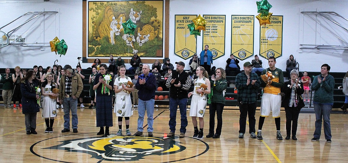 St. Regis Senior Night was held last Saturday where three members of the girls basketball team and one from the boys team were honored along with parents and relatives. (Kathleen Woodford/Mineral Independent)