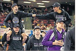 Polson teammates and coaches were part of the introduction of teams to open the All-Class State Wrestling Tournament on Friday in the Rimrock Auto Arena at MetraPark in Billings. (Courtesy photo)