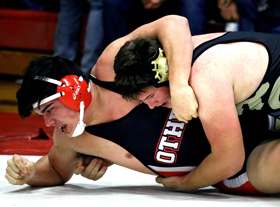 Rodney Harwood/Sun Tribune
Royal&#146;s Ryder Eilers, right, takes down Isaiah Perez of Othello during the Leonard Schutte Invitational. Eilers is the SCAC East District 285-pound champion and a contender in the 1A state tournament this weekend at the Tacoma Dome.