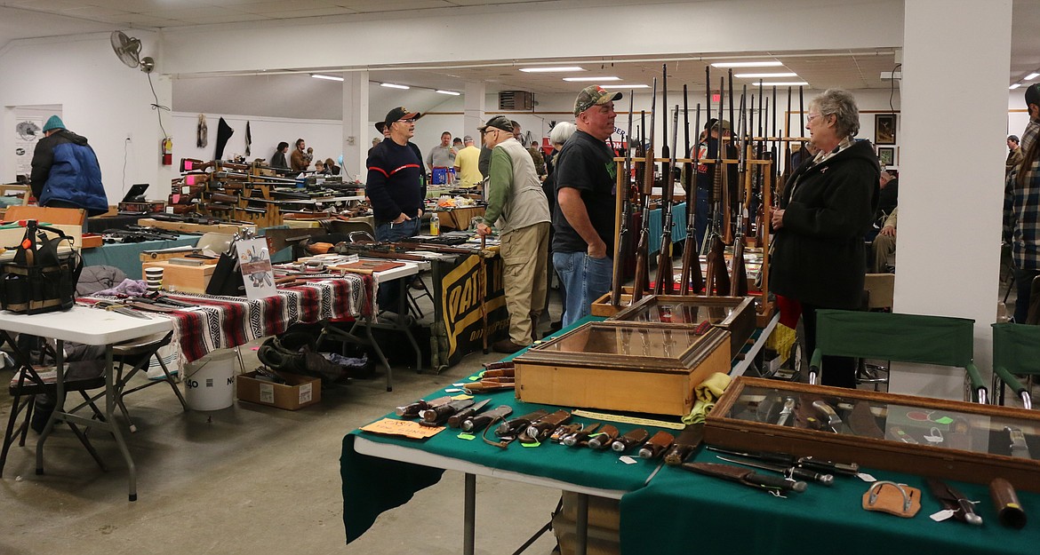 Photo by MANDI BATEMAN
There were 35 full tables of guns, knives, and other items at the show this year.