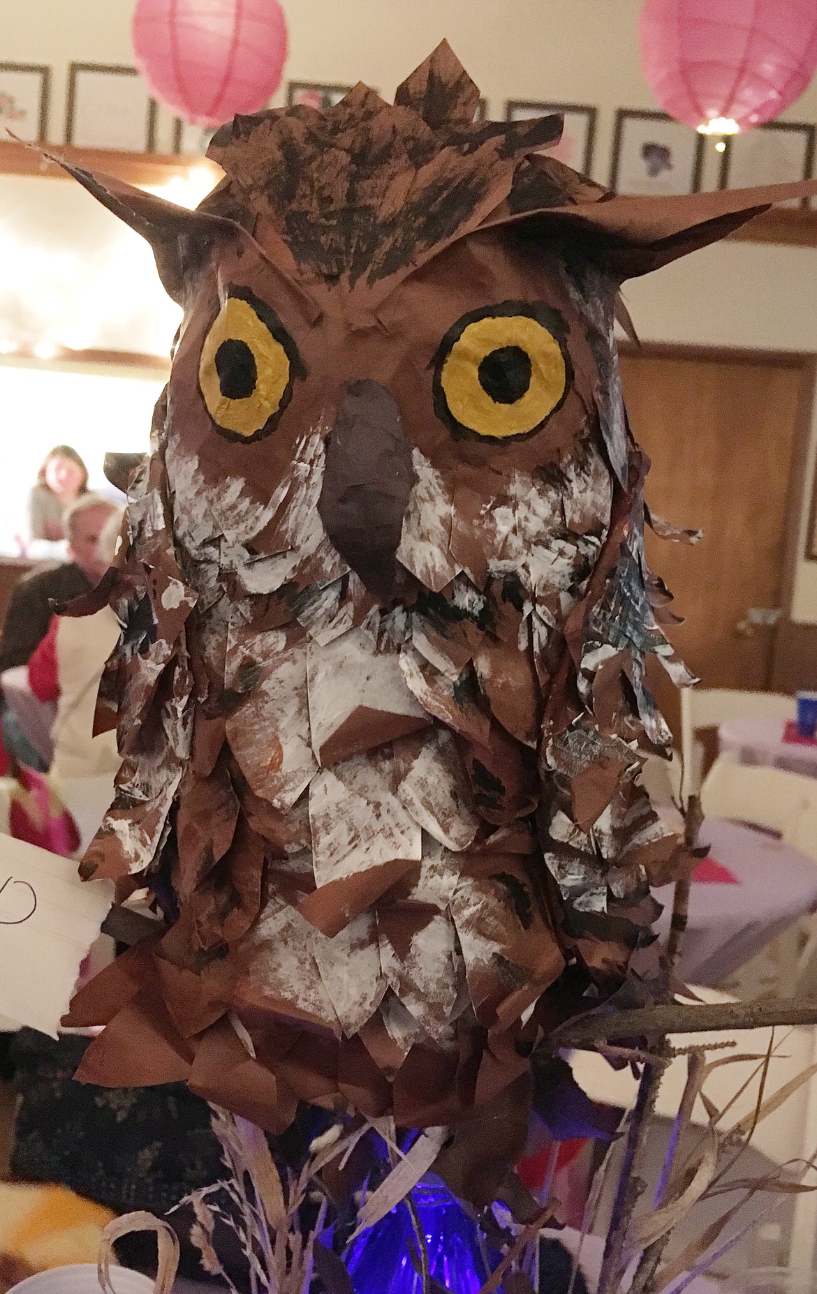 CENTERPIECE STRUCTURES by Charlo art students, like this detailed owl, adorned every table at the NAG fundraiser. This masterpiece is by Taylor Olsen.