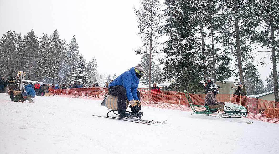 Pat Catellino and Nic Lee of Glacier Distilling, foreground, are off and running.