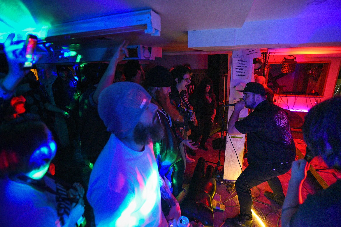 Undying Avarice performs at an underground show.