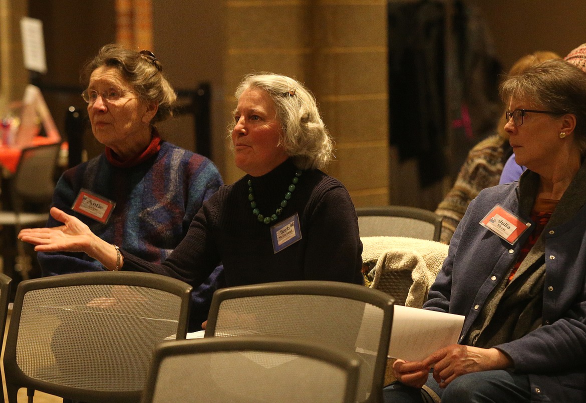 During a public forum on education Wednesday evening at The Coeur d'Alene Public Library, Barb McFarland asks Steve Cook, superintendent of the Coeur d'Alene School District, a question about preschool funding.
 (LOREN BENOIT/Press)