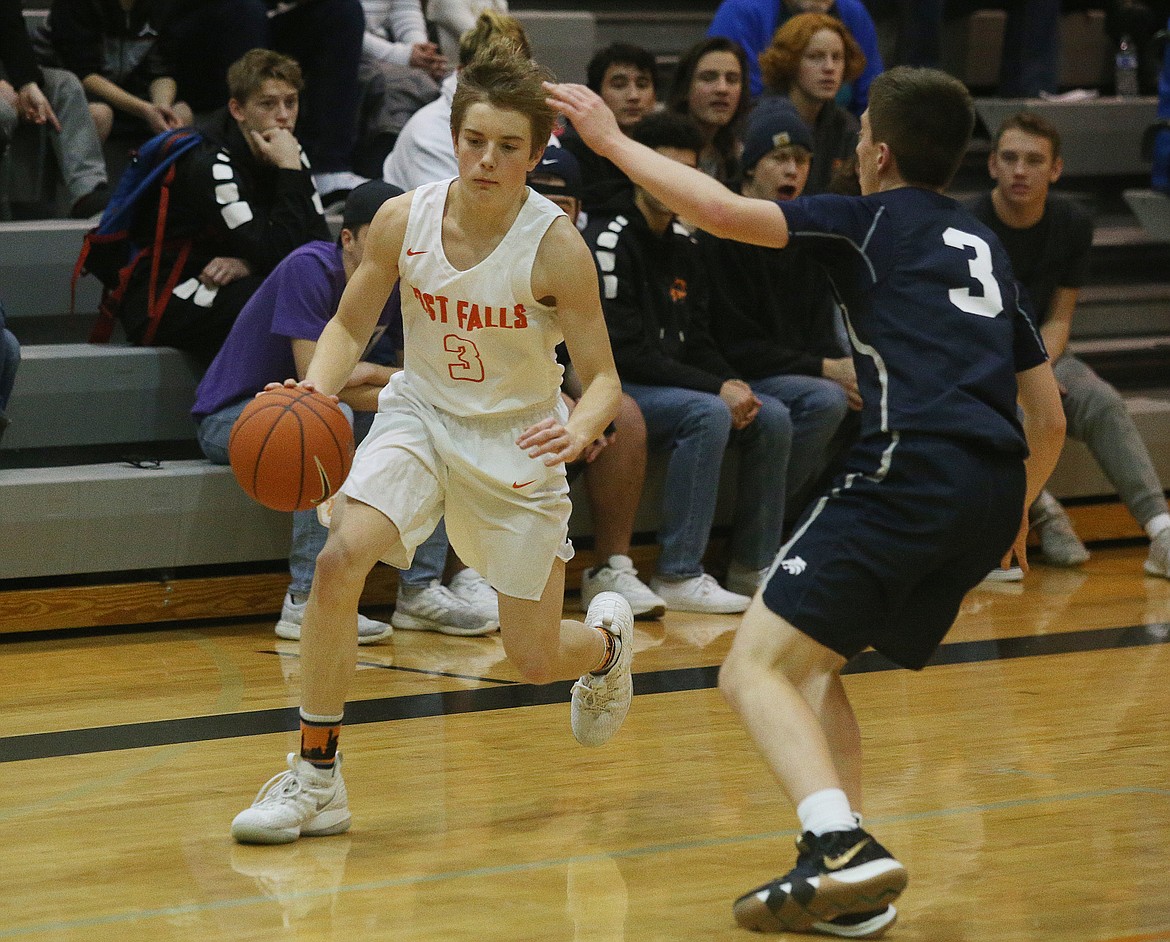 LOREN BENOIT/Press
Post Falls sophomore guard Caden McLean drives to the basket during a game against Lake City in January.