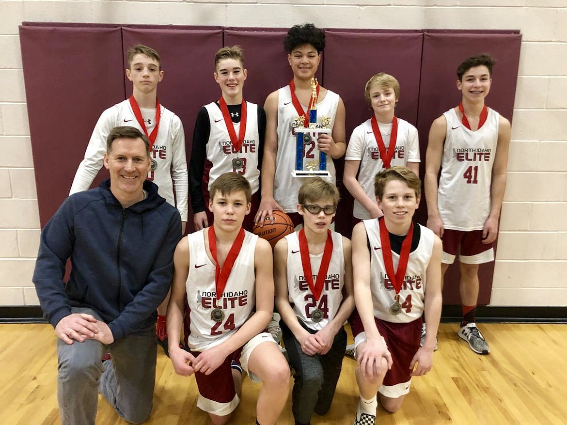 Courtesy photo
The North Idaho Elite seventh-grade boys basketball team took second place at the Lake City Shootout last weekend in Coeur d'Alene. The team won four games before falling to the Idaho Phenoms in the championship game. In the front row from left are coach Keith Orchard, Logan Orchard, Neil McCarthy and Chris Reynolds; and back row from left, Gunner Larson, Max Entzi, DJ Brown, Trey Nipp and Joseph Hagel.