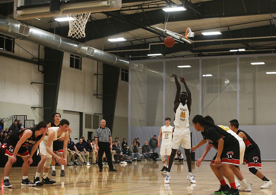 Kon Ajang of Genesis Prep shoots a free throw in Friday night&#146;s 1A Division II District 1 championship game at The Courts at Real Life Ministries in Post Falls.