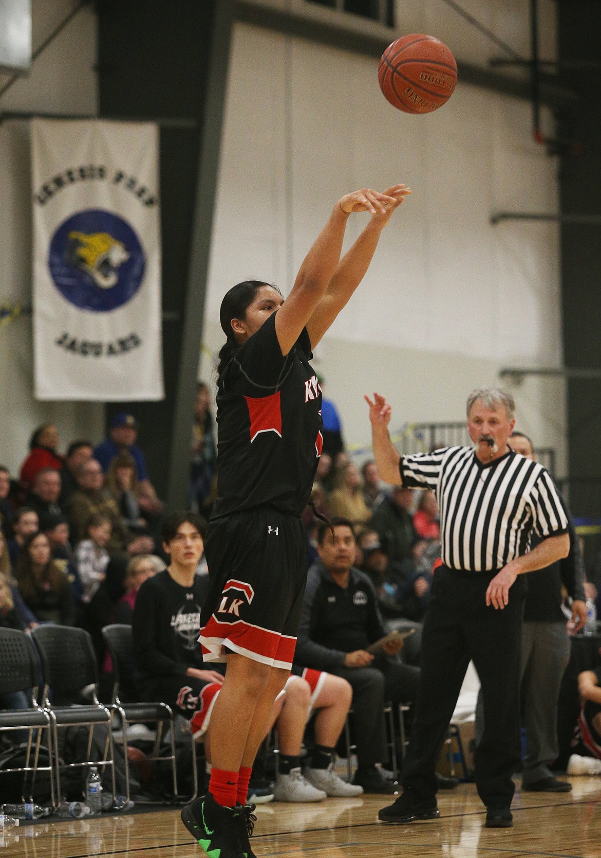 Lakeside&#146;s Emmitt White shoots a 3-pointer in Friday night&#146;s game against Genesis Prep in the 1A Division II District 1 championship.