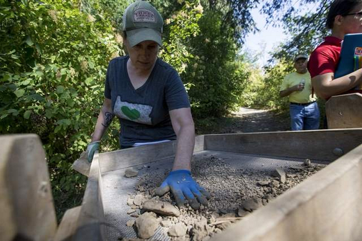 LOREN BENOIT/Press File
University of Idaho archaeology grad student Marci Monaco screens dirt to find cultural material during a dig in 2017 at Pen d&#146;Oreille City, which was one of the first settlements in North Idaho. An application has been submitted to place the site on the National Register of Historic Places.