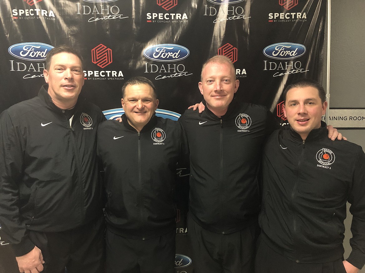 JASON ELLIOTT/Press
District 1 basketball officials, from left, Mike Floch, Paul Manzardo, Todd Bitterman and Dominic Dire, worked together during the state 5A girls basketball championship game between Mountain View and Eagle at the Ford Idaho Center in Nampa.