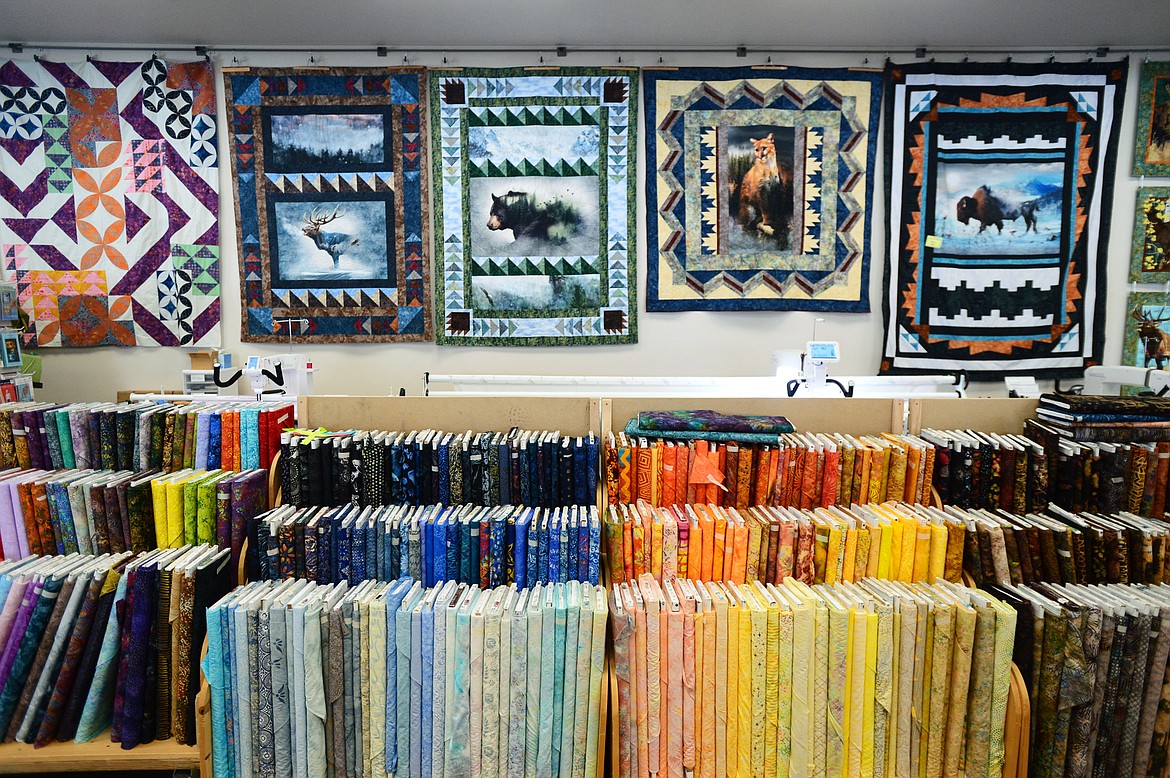 Reams of fabric and quilts on display at Quilt Gallery&#146;s new location at 84 Frontage Park in Kalispell on Tuesday, Feb. 19.