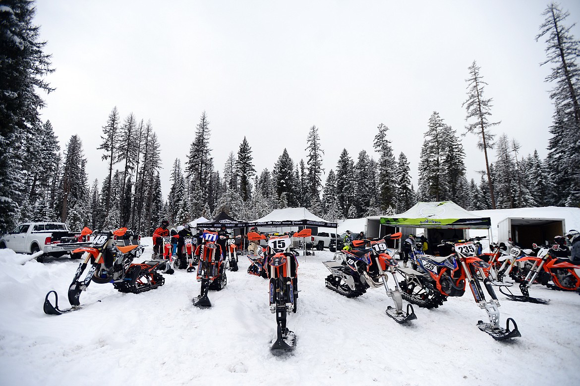 Snow bikes await their riders prior to the start of Round 4 of the 509 National Championship Snow Bike Series race at the ATV park located at 6235 U.S. 93, north of Whitefish, on Saturday, Feb. 23. Racing action continues at 10 a.m. next Saturday, March 2, with the Montana Mayhem Offroad Racing Series Frostbite Frenzy ATV/UTV race. (Casey Kreider/Daily Inter Lake)