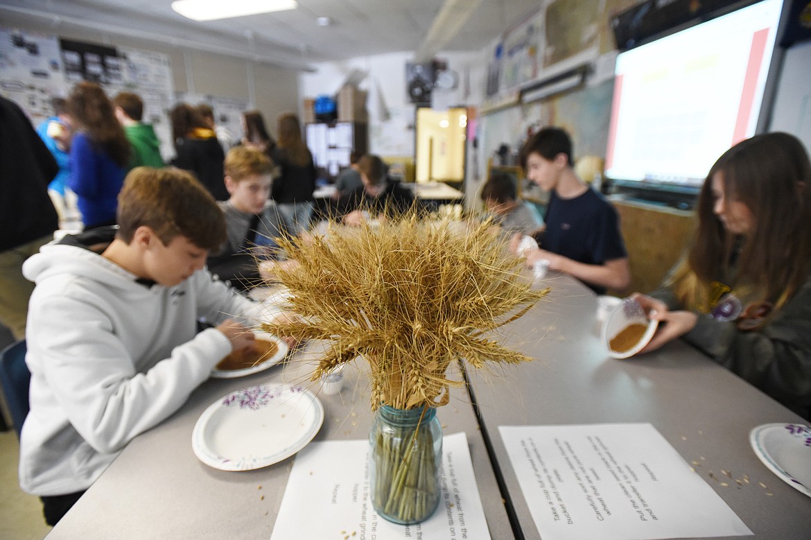 Eighth-graders separate wheat from chaff in Kris Schreiner&#146;s Montana History class at Kalispell Middle School on Tuesday, Feb. 19. (Casey Kreider/Daily Inter Lake)