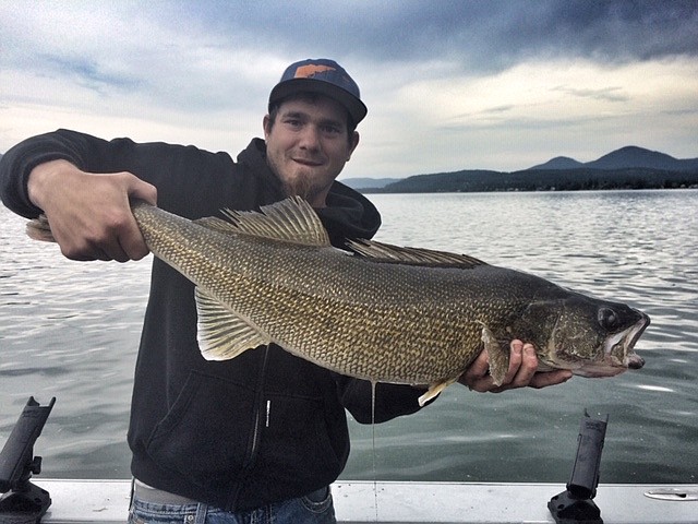 Justin Bellgard hoists a 10-pound plus walleye taken on Lake Pend Oreille.