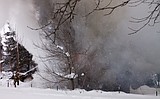 Firefighters battle house fire in Martin City