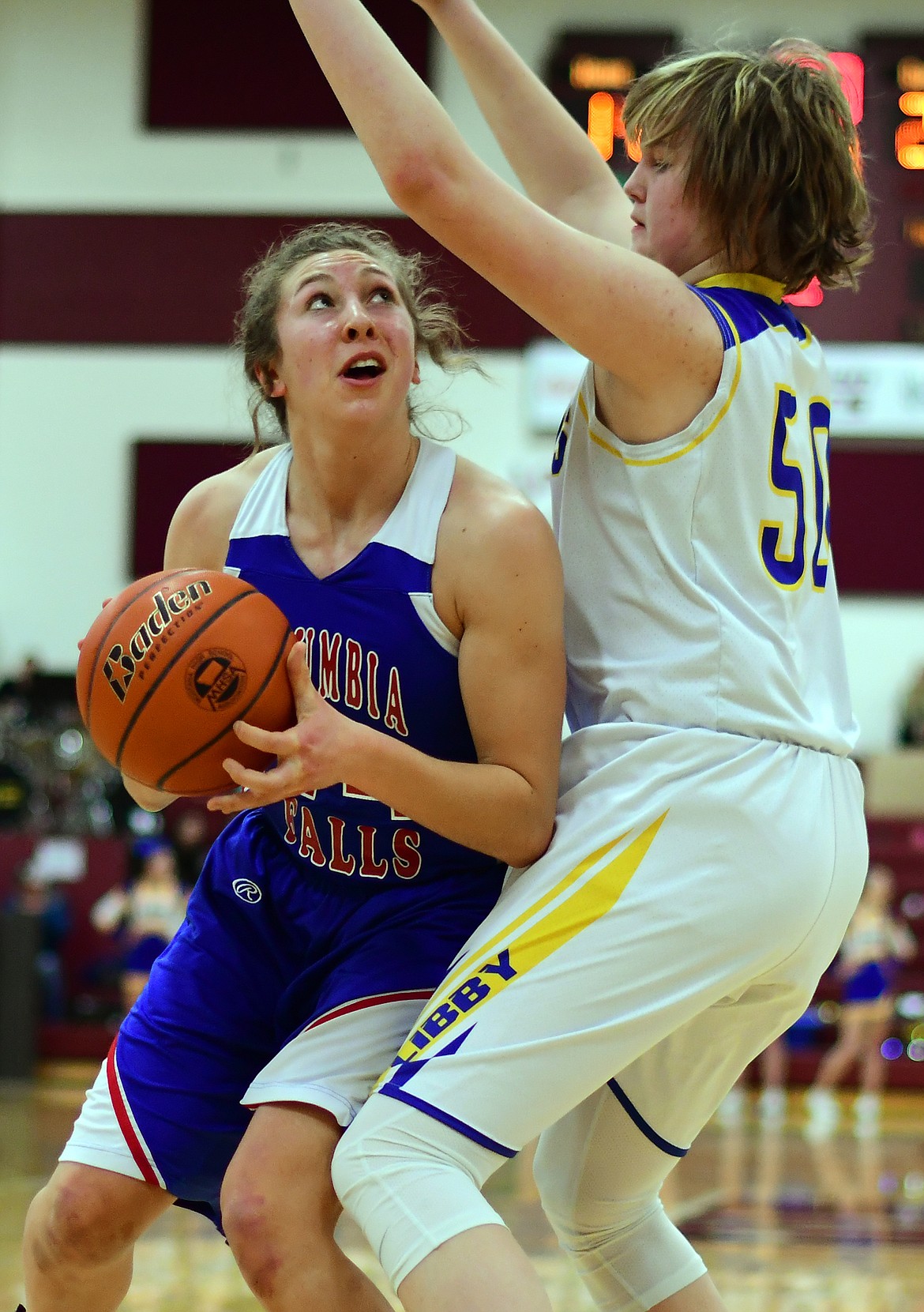 Josie Windauer looks for room to operate against Libby&#146;s Taylor Holm Friday. (Jeremy Weber photo)