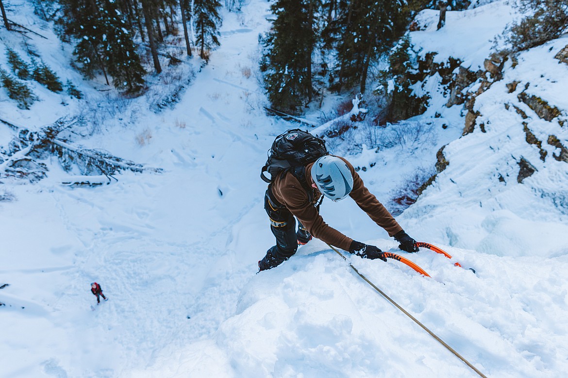 A climber ascends a pitch of ice on a Whitefish Vertical Adventures guided climb. (Tyrun Severson photo)