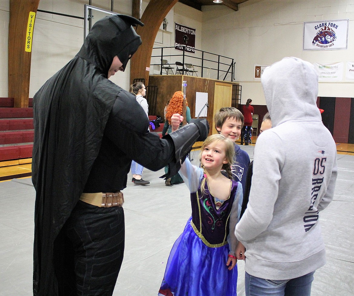 Batman (Isaac Warren) high-fives his fans during Saturday&#146;s Super Hero Princess Party in Alberton. 

(Kathleen Woodford/Mineral Independent).