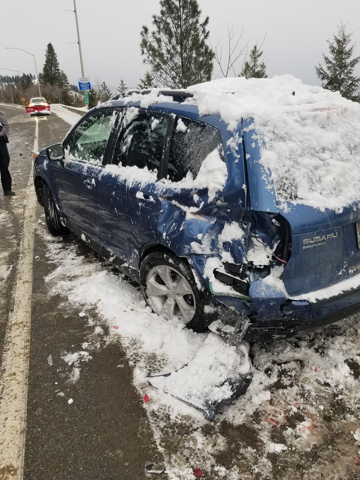 (Courtesy Photo)
Bill Tompkins vehicle was struck when he attempted to change a flat tire on the North Hill.