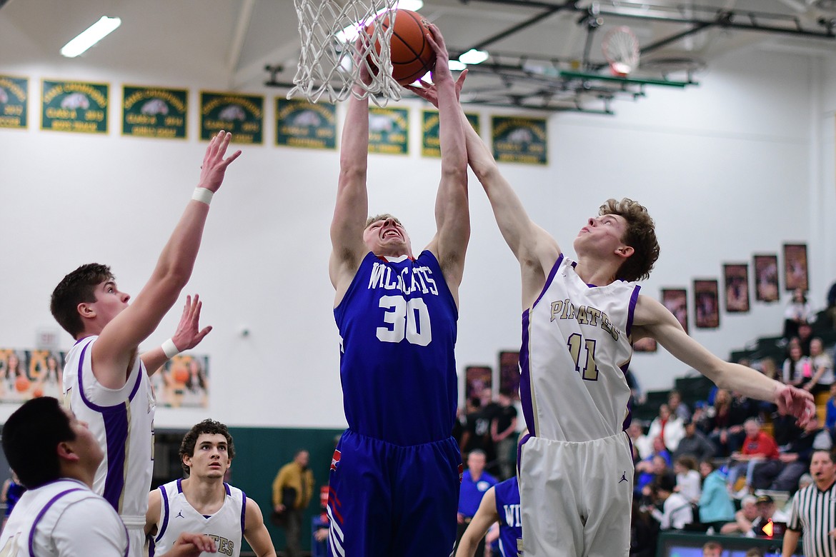 Zack Pletcher battles for a rebound against Polson Thursday. (Jeremy Weber photo)