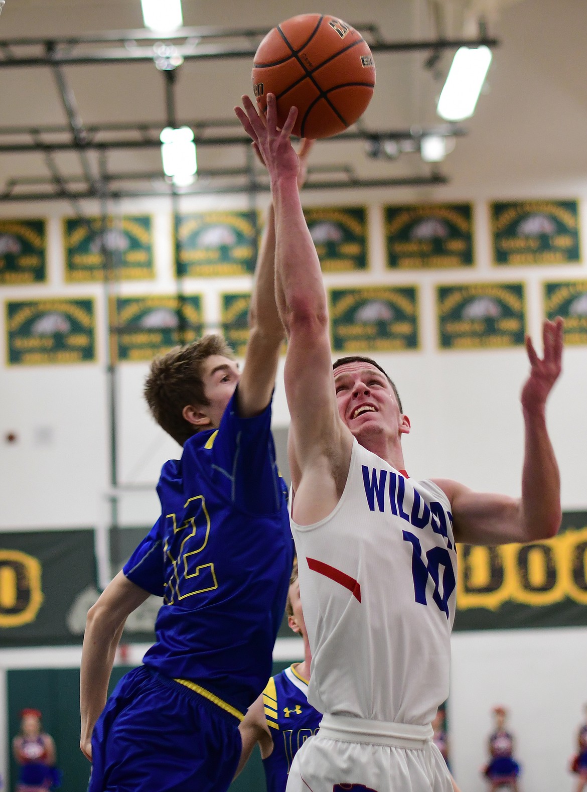 Dillon Wanner battles for a rebound against the Loggers Saturday. (Jeremy Weber photo)