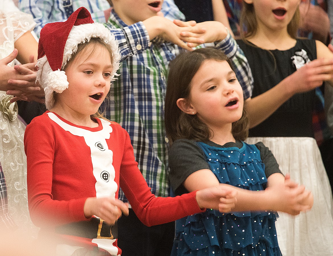 Students sing at Ruder Elementary earlier this year.