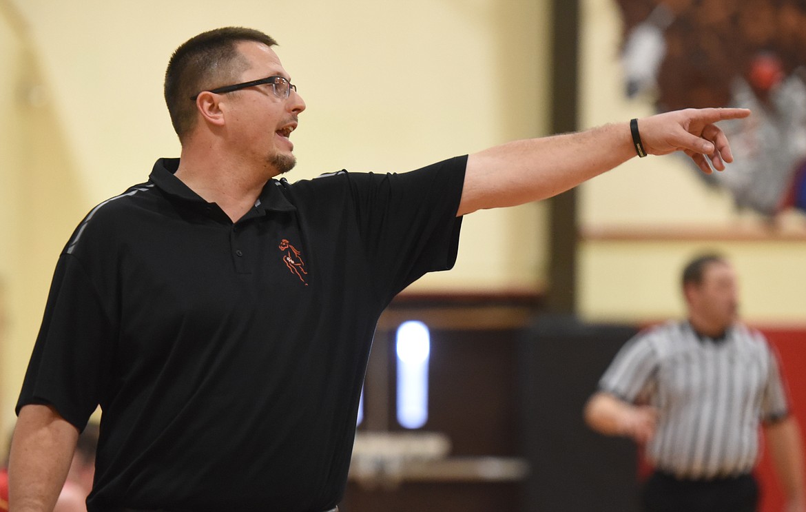 PLAINS BOYS' head coach Tyrel Allen gives his team guidance during the Horsemen's 14C District Tournament game against Noxon in Pablo. (Joe Sova/Clark Fork Valley Press)