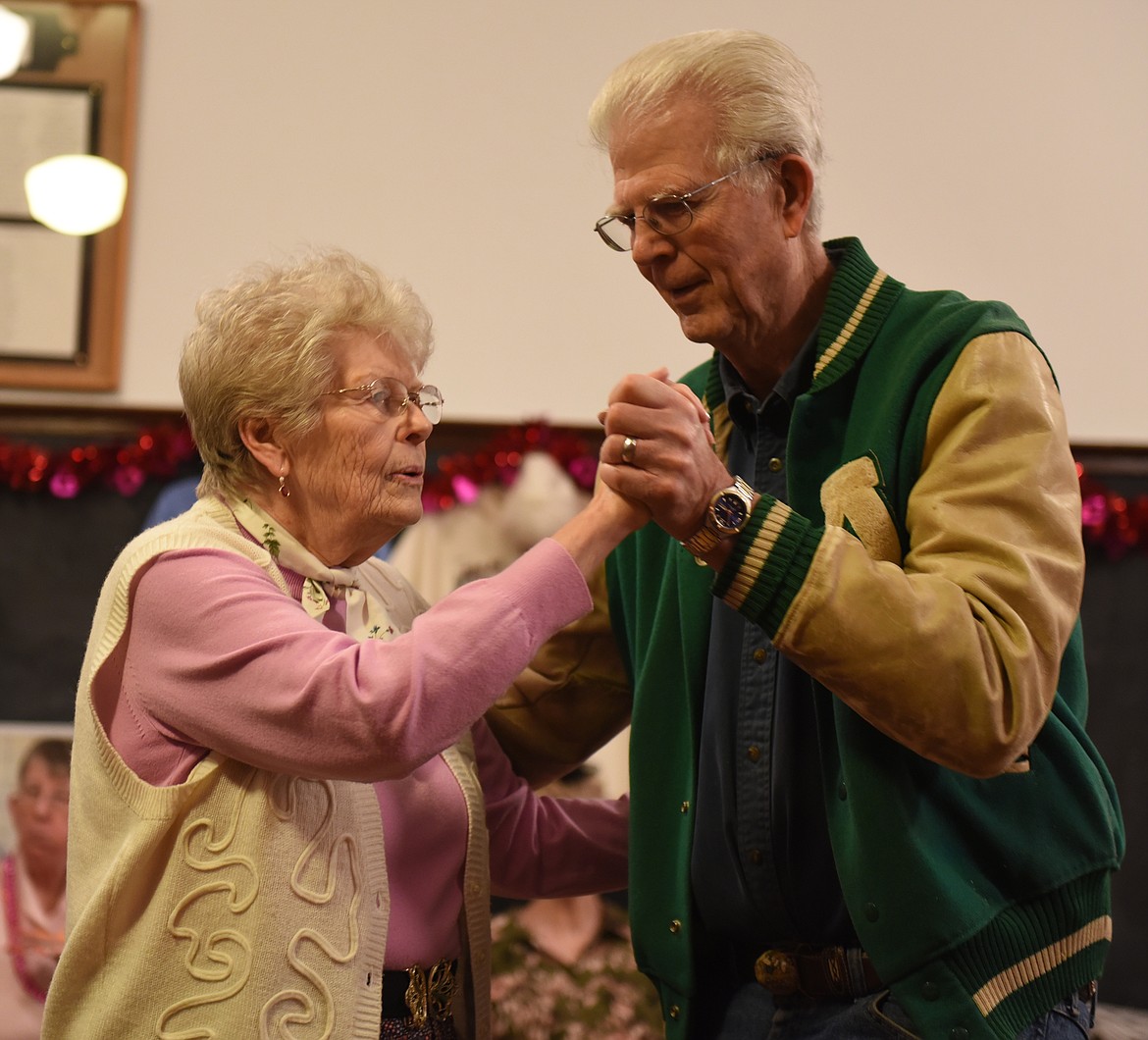 LEE AND Sonya Engretson, who coordinated the Big Arm Association&#146;s Valentine&#146;s Day sock hop, dance the two-step to music by Charles Lutz.