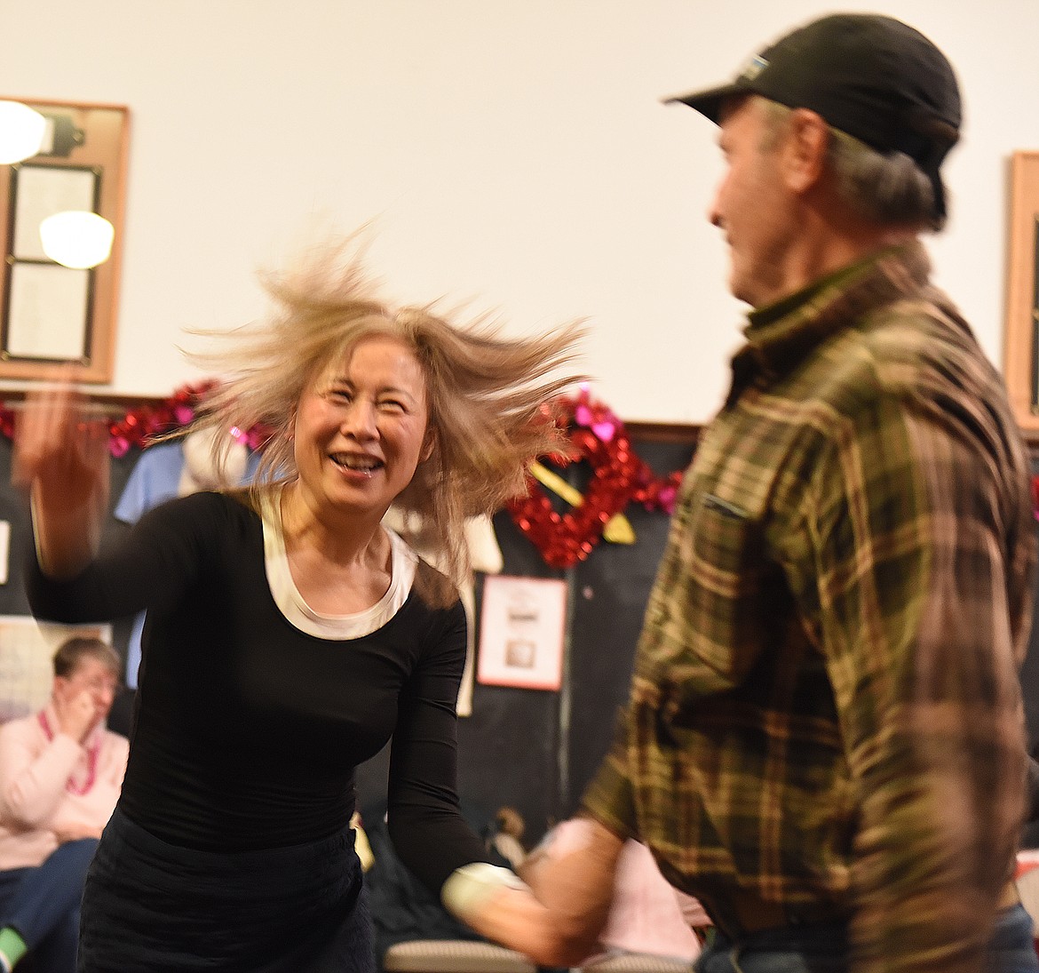 BIG ARM Association hosted a Valentine&#146;s Day sock hop last Thursday at the old schoolhouse at Big Arm. Charles Lutz, a science and math teacher at Mission Valley Christian Academy, provides &#145;50s and &#145;60s tunes. Susan Liang provided plenty of movement on the dance floor during the Valentine&#146;s Day sock hop. She is dancing with her husband, Brian Liang. 

(Joe Sova photos/Lake County Leader)