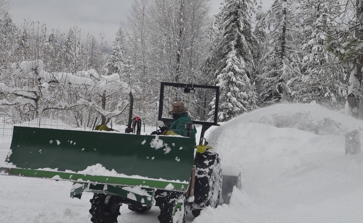 A member of the anonymous snowplow brigade clearing drives all last week. (Carolyn Hidy photos/Clark Fork Valley Press)